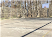 A photo of the basketball courts in Homestead Park, which will become pickleball courts