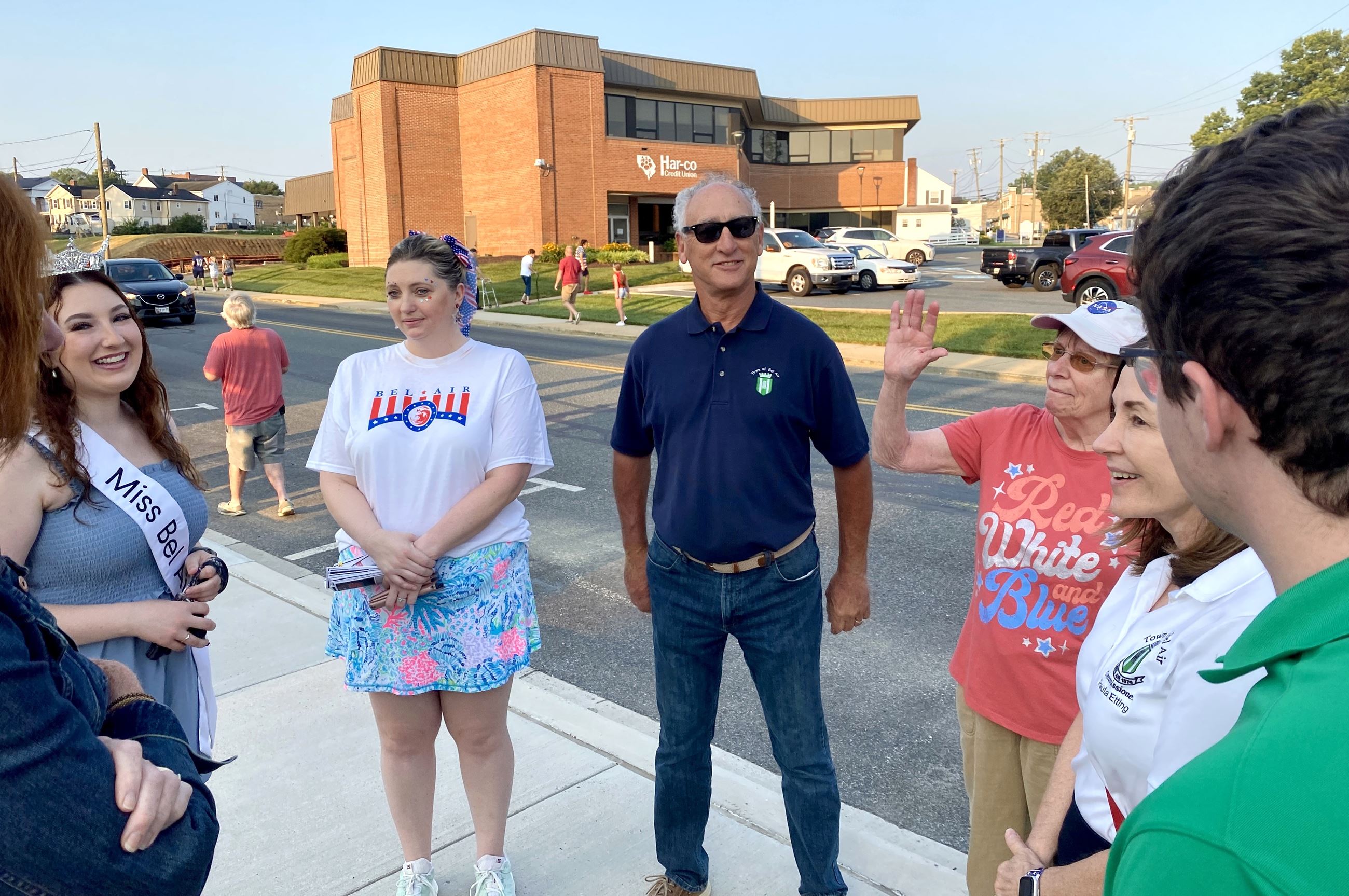 Photo of people chatting after the Independence Day flag raising at Bel Air Town Hall